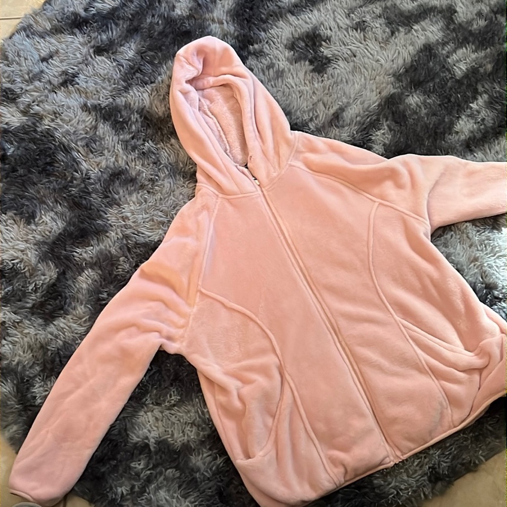 Plus sized fuzzy zip up jacket.